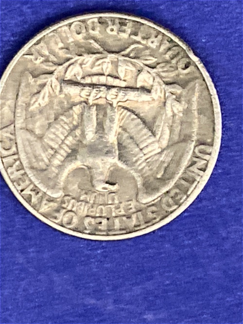 1972-No-Mint-Mark-Quarter-Seems-To-Be-Struck-Over-Another-Coin?